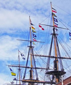 Naval signal flags have long been used to "stand for" words or phrases useful in coordinating naval maneuvers. Here the museum ship HMS Victory spells out the message, "England expects that every man will do his duty" made famous during the battle of Trafalgar