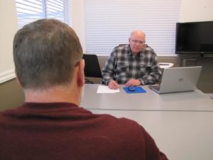 Instructor Paul H. Smith, PhD monitoring student Russell Pickering working on a controlled remote viewing session