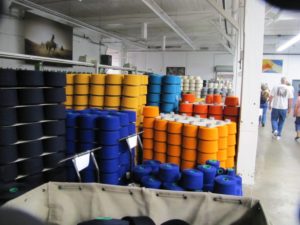 Lots of colorful yarn and wool fabric inside the Pendleton Woolen Mills